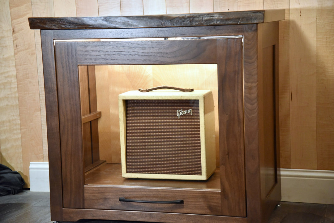 Interior of the walnut Amp Cabinet with the amplifier on its roll-out shelf