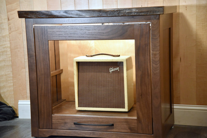 Interior of the walnut Amp Cabinet with the amplifier on its roll-out shelf