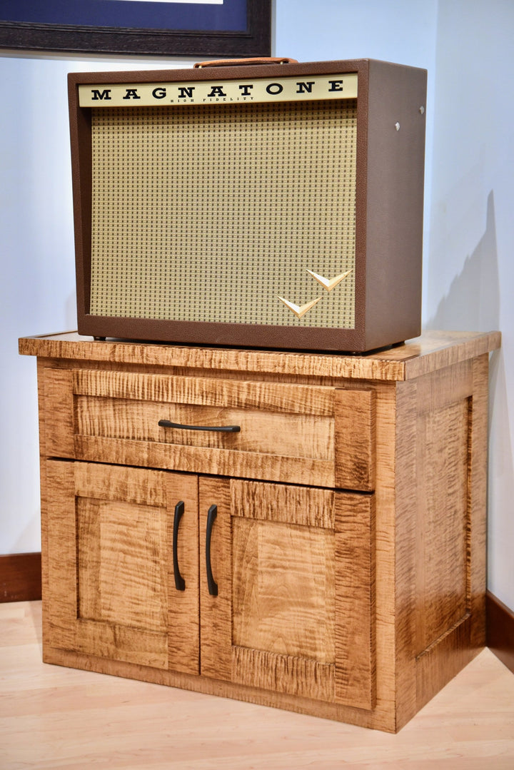 Front view of the flamed maple Amp Stand with amplifier on top