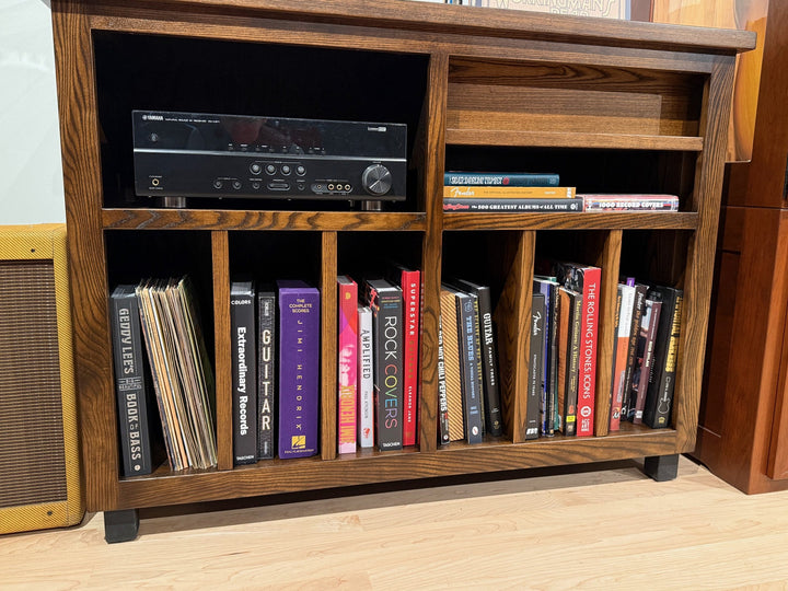 Ash Record Console loaded with books and records across the lower storage