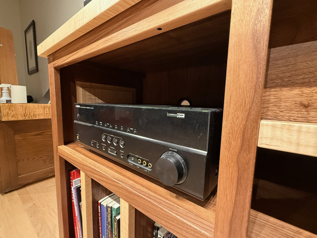 Album cover standing in the top slot with the turntable and receiver alongside