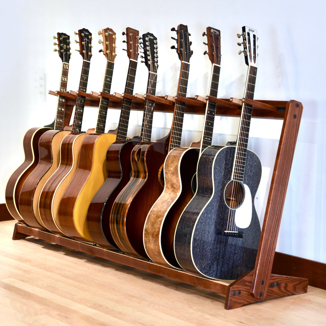 Grand StringRack in ash holding a row of guitars